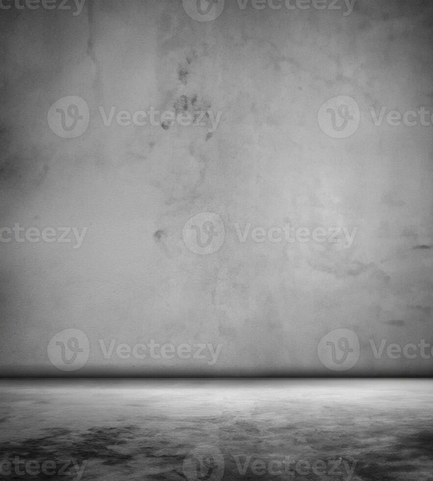 Empty grey concrete floor and blank stone wall room background photo