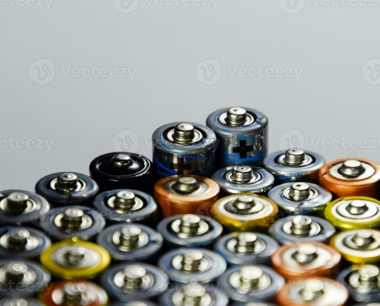 Salt and alkaline batteries, source of energy for portable technology. AAA and AA batteries photo