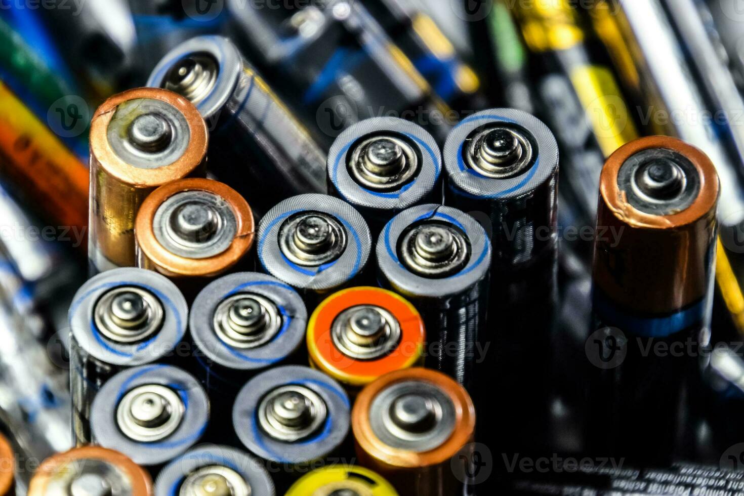 Salt and alkaline batteries, source of energy for portable technology. AAA and AA batteries photo