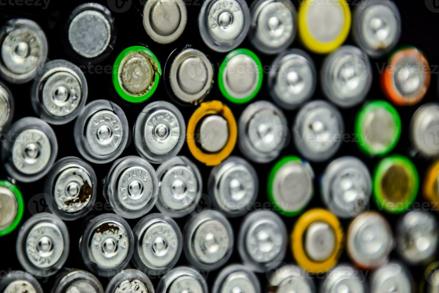 Salt and alkaline batteries, source of energy for portable technology. AAA and AA batteries photo