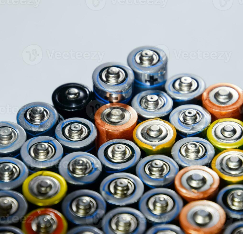 Salt and alkaline batteries, source of energy for portable technology. AAA and AA batteries photo