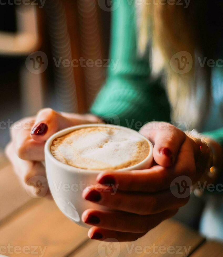 A cup of Italian-style coffee with milk ideal for the Christmas season photo