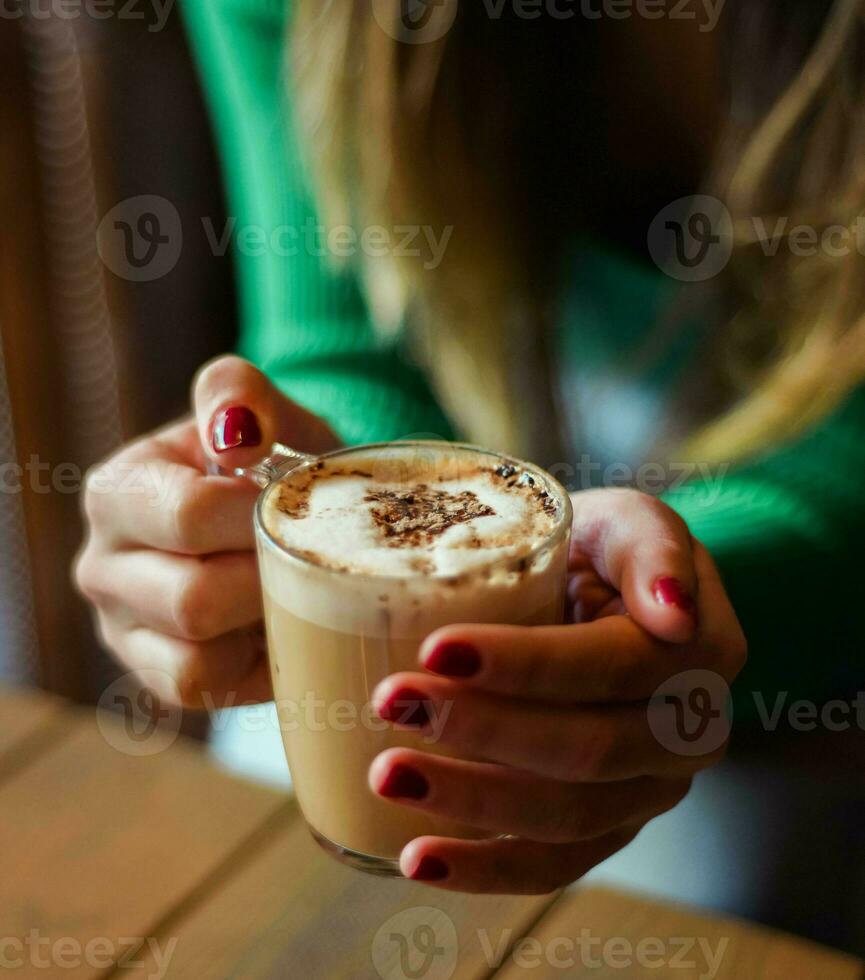 A cup of Italian-style coffee with milk ideal for the Christmas season photo