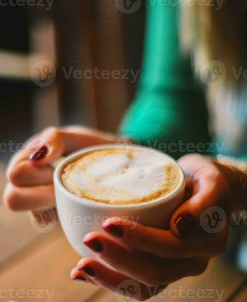 A cup of Italian-style coffee with milk ideal for the Christmas season photo