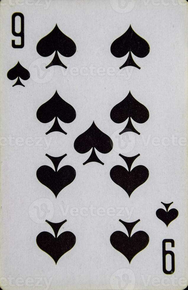 Playing card nine peak suit of spades. photo