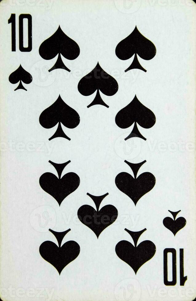 Playing card ten peak, suit of spades. photo