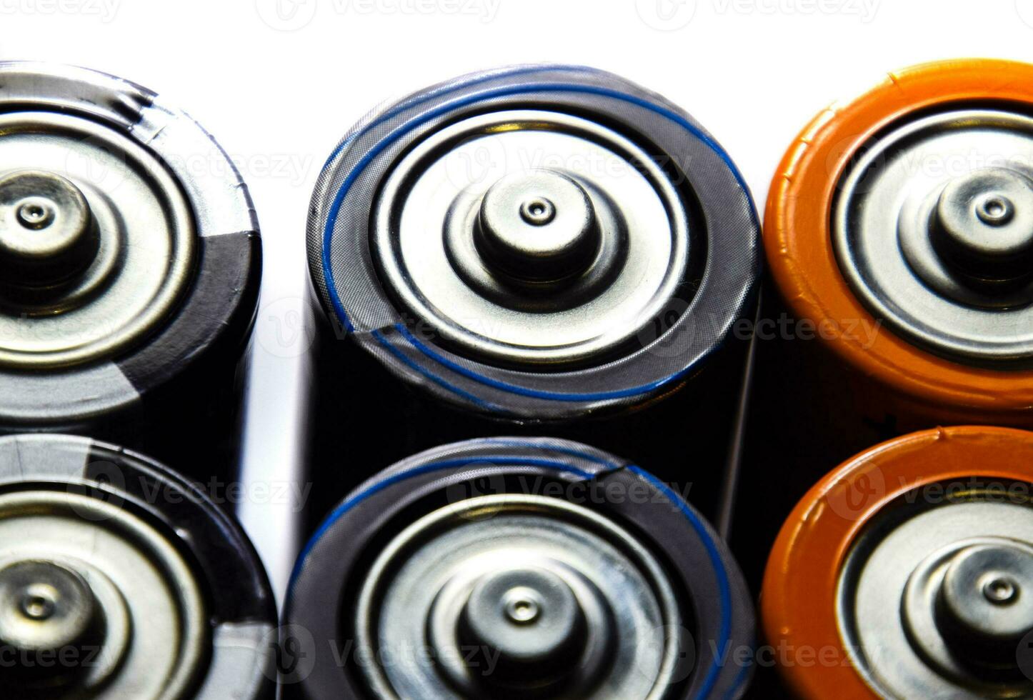 Salt and alkaline batteries, source of energy for portable technology. AAA and AA batteries photo