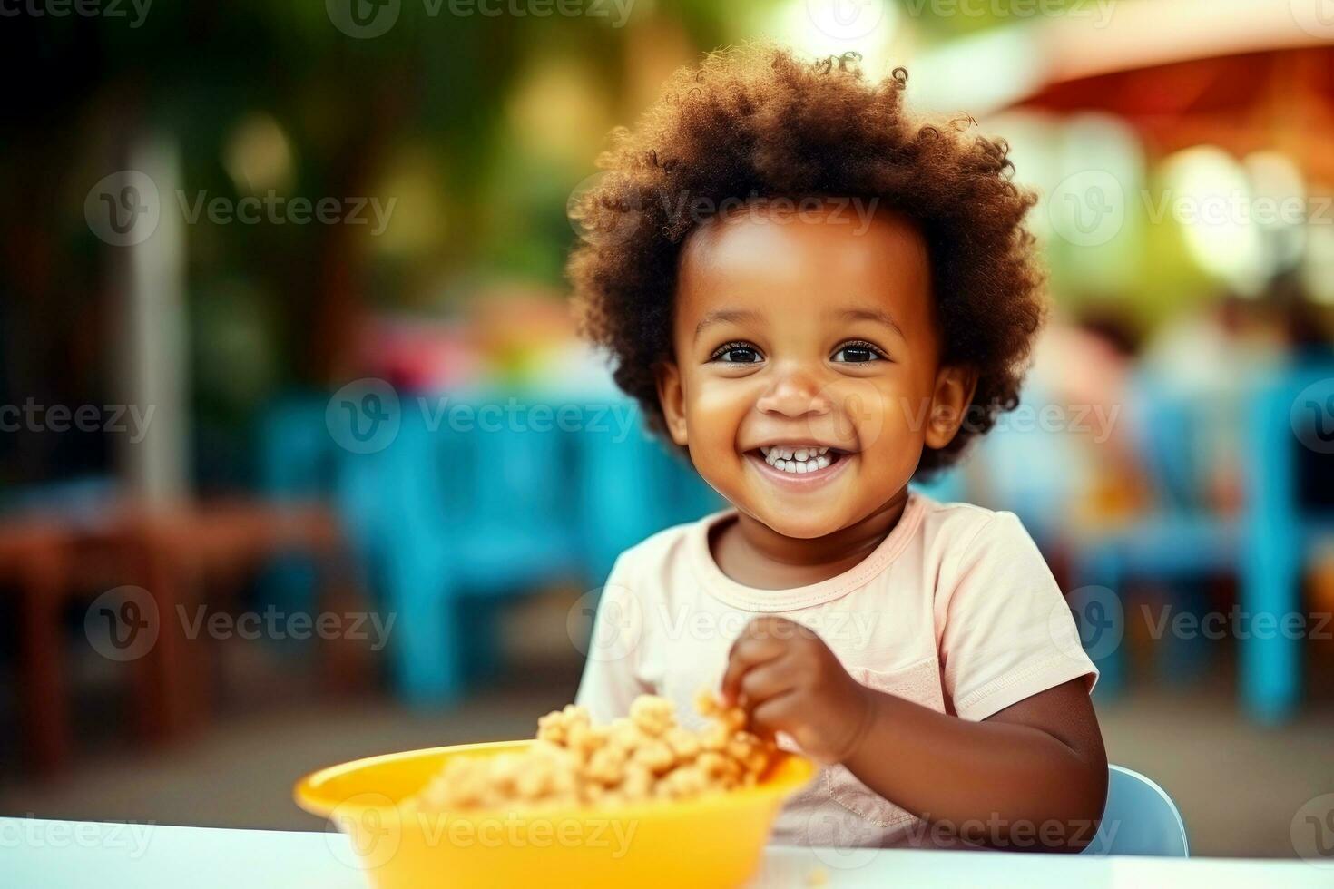 AI generated African child smiling and eating a plate full of food. Generative AI photo