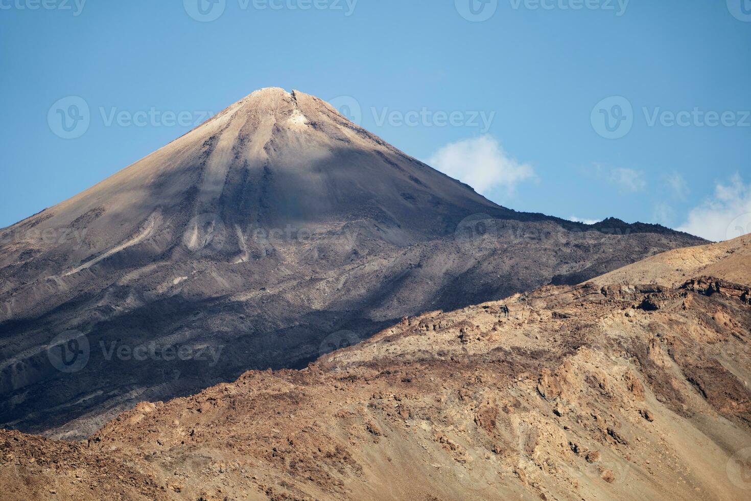 View of Mount Teide, the highest mountain of Spain situated in the Canary Islands, Spain. Famous destinations for hikers. Teide National Park, Unesco World Heritage Site. photo