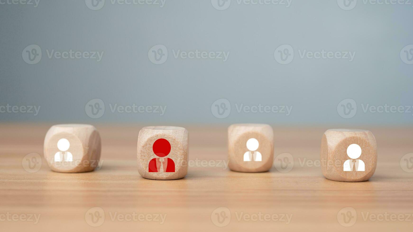 Wooden block printed icon of CRM concept representing business goal selection, target customers, marketing plan and strategy, customer centric strategy. photo