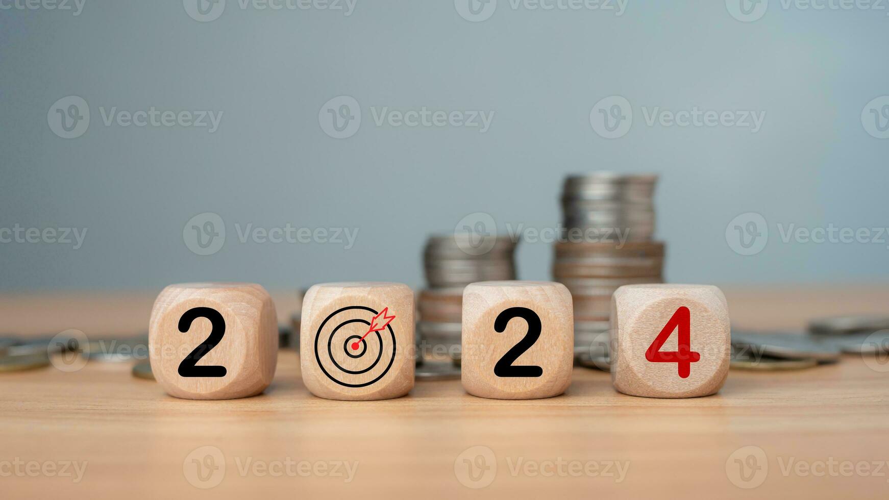 Wooden blocks lined up with the letters 2024, Represents the goal setting for 2024, the concept of a start, financial planning development strategy business goal setting, Budget, tax, investment. photo