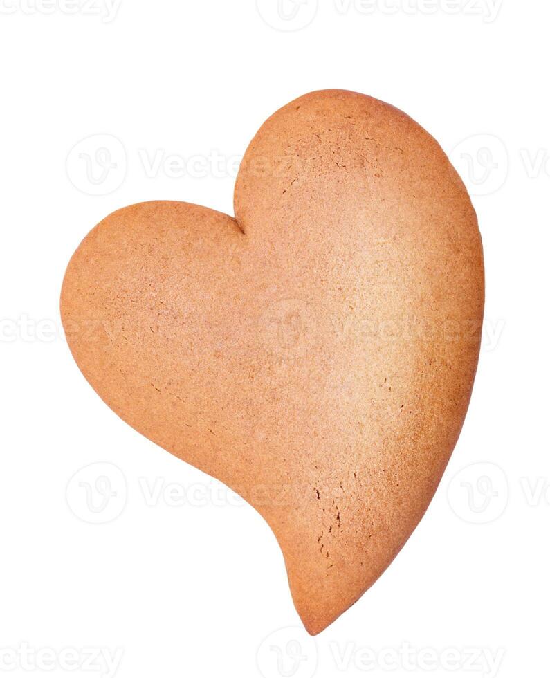 Gingerbread in the form of a heart isolate. Dessert macro photo. Sweets are delicious. photo