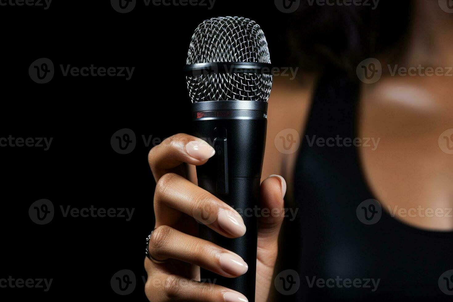 AI generated close up of hand holding a microphone bokeh style background with Generative AI photo