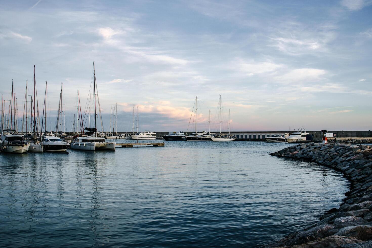 Yachts in the port, sailboats modern water transport. Olympic port, Barcelona, Catalonia. photo