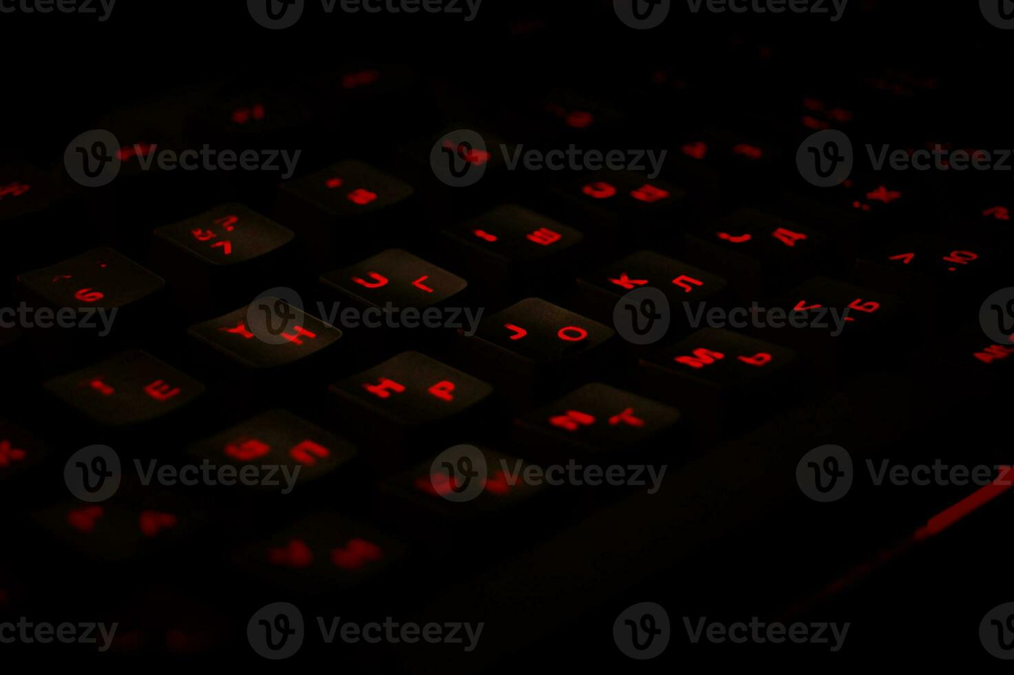 Backlit gaming keyboard close up. photo