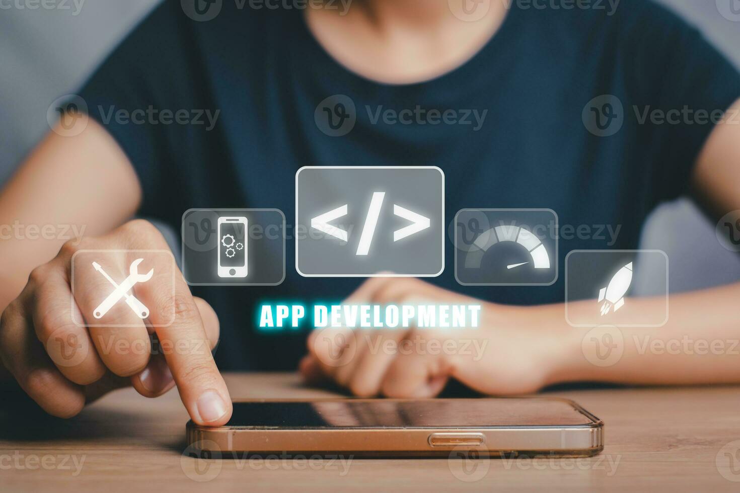 App development concept, Person hand using smart phone with app development icon on virtual screen background, Designing application for mobile phone. photo