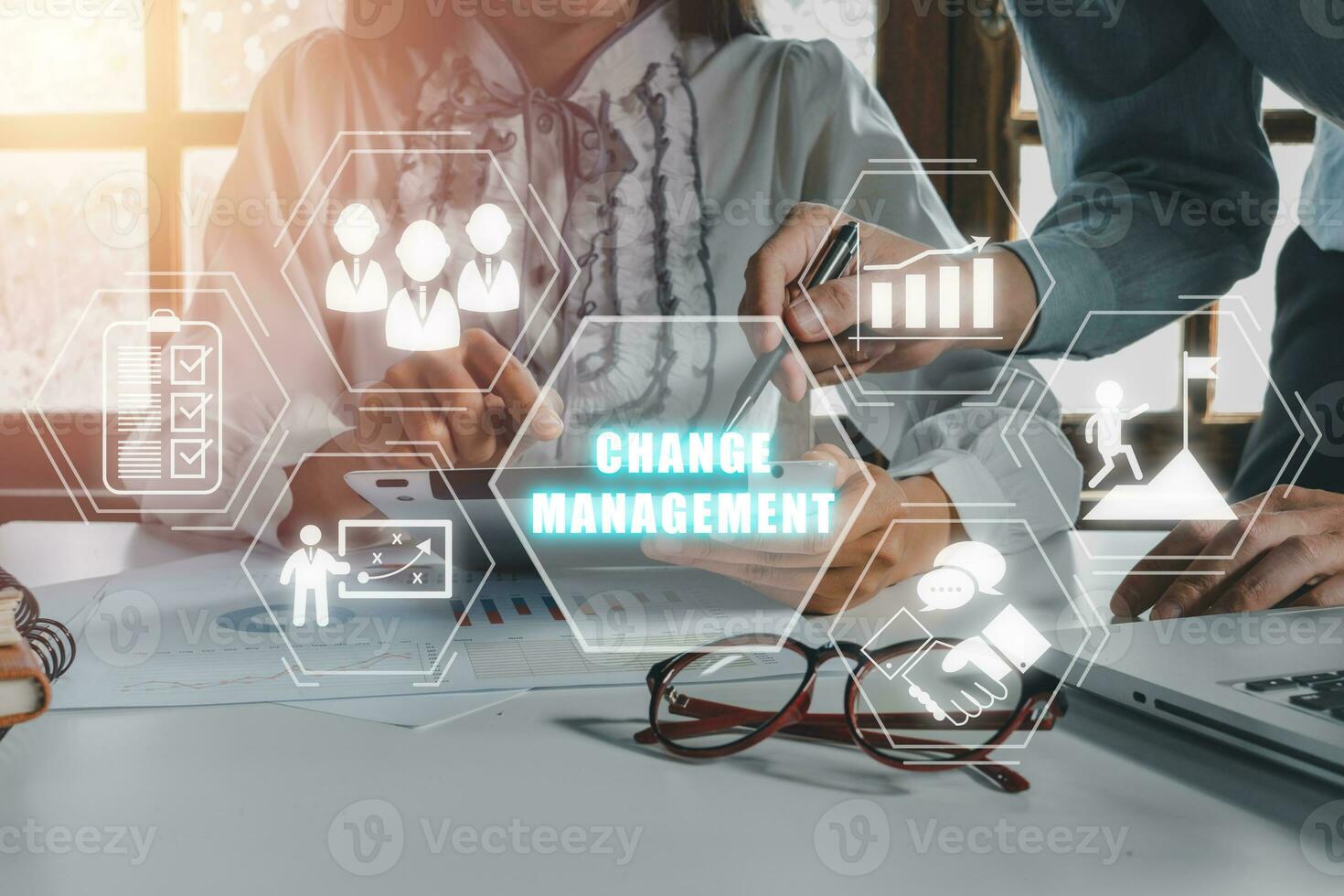 Change management in organization and business concept, Business team analyzing income charts and graphs with change management icon on virtual screen background, plan, implementation. photo