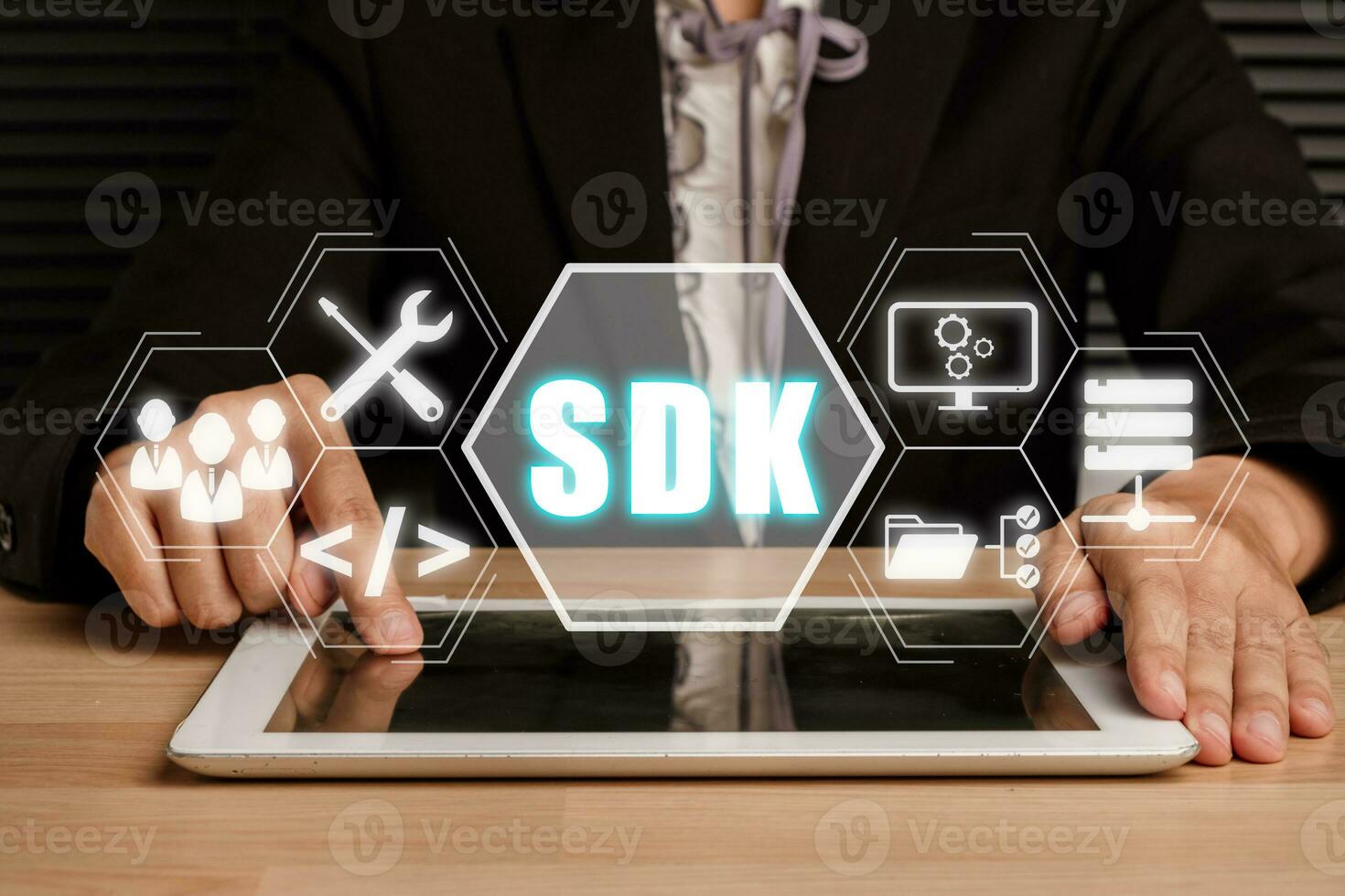 SDK - Software development kit programming language technology concept, Person using digital tablet with SDK icon on virtual screen. photo