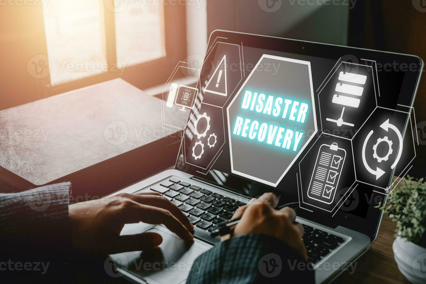 Disaster Recovery concept, Person hand using laptop computer with Disaster Recovery icon on virtual screen. photo