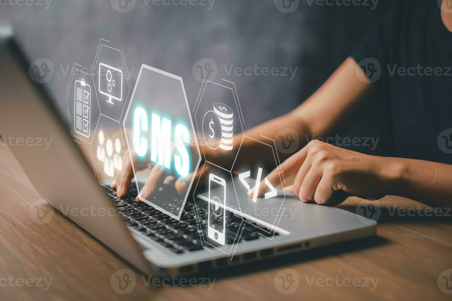 CMS, Content management system concept, Person hand using laptop computer with Content management system icon on virtual screen background, business web computer website administration. photo