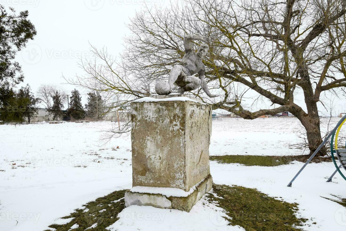 Monument to the football player near the stadium in the settlement of Elitnyy Krasnodar Krai. photo