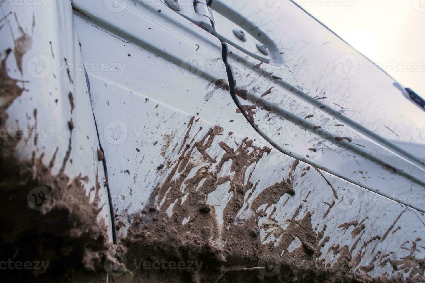 Mud stain on the side of car photo