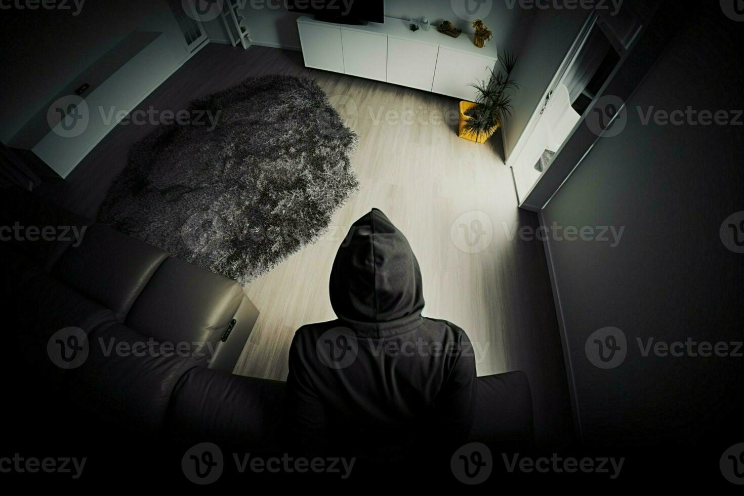 AI generated Home invasion Overhead view of a thief in a hooded sweatshirt photo