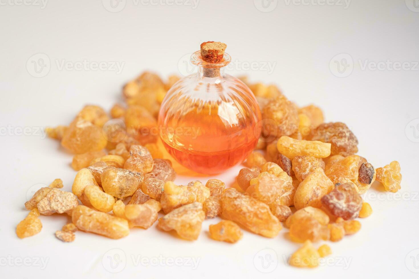 Frankincense or olibanum aromatic resin isolated on white background used in incense and perfumes. photo
