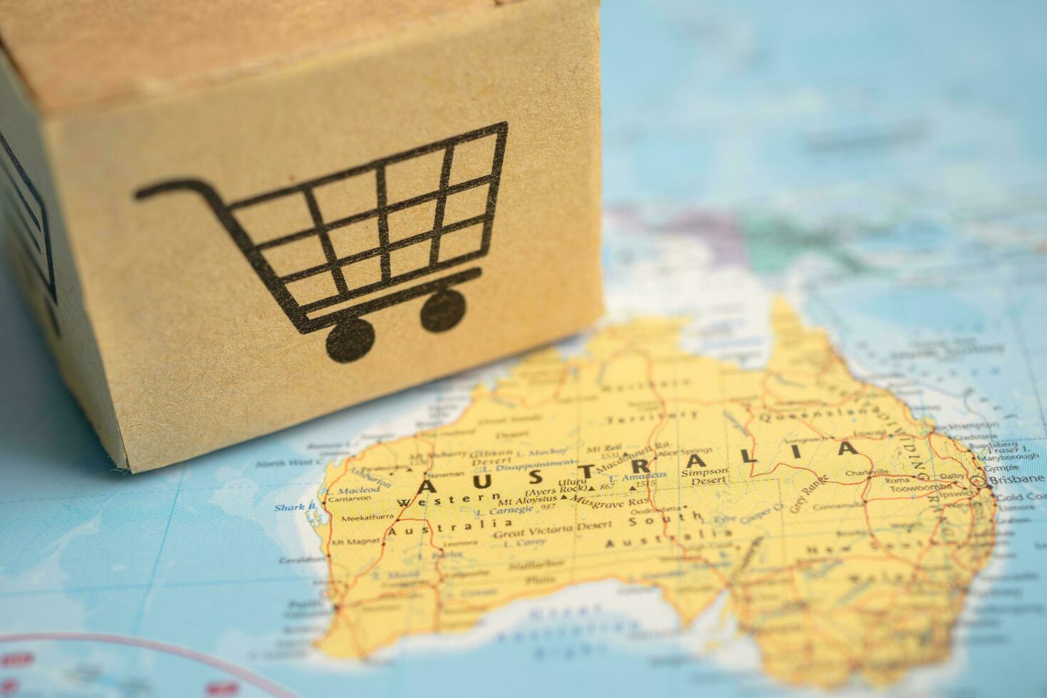 bangkok, Tailandia marzo 1, 2023 caja con compras en línea carro logo en Australia mapa, importar exportar compras en línea o comercio Finanzas entrega envío, comercio, proveedor. foto