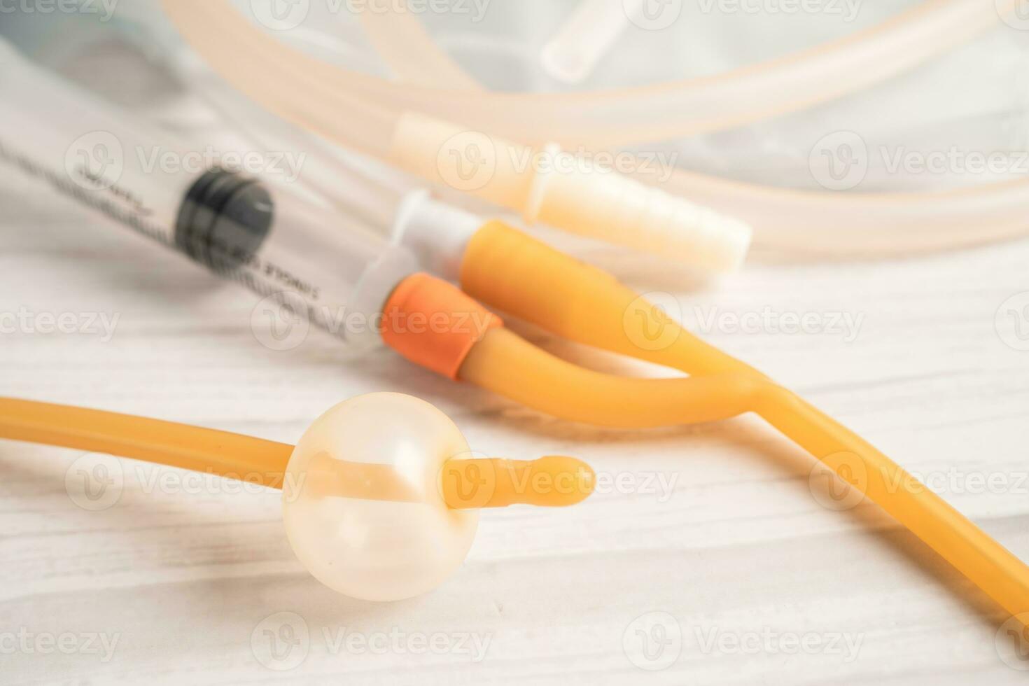 Foley urinary catheter with urine bag for disability or patient in hospital. photo