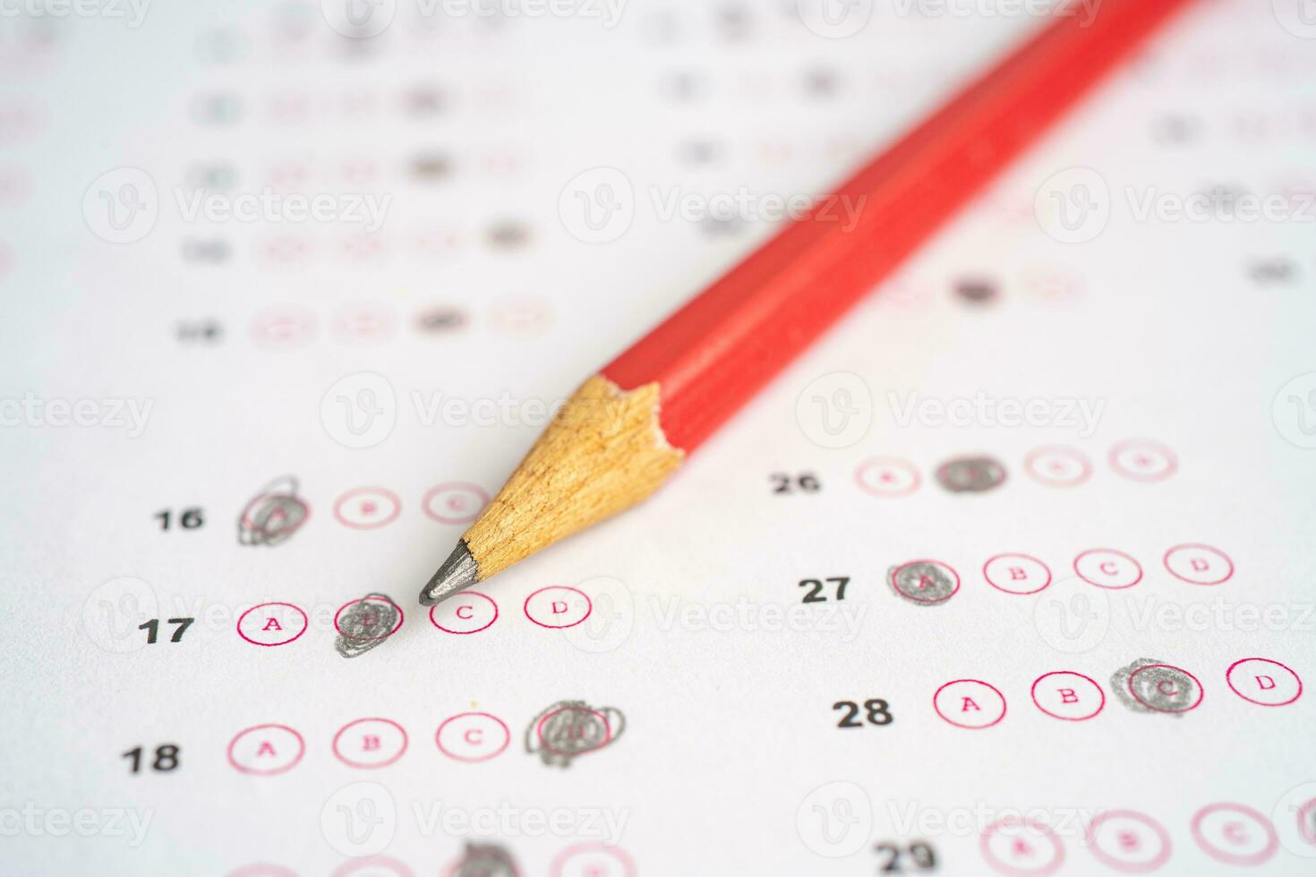 Answer sheets with pencil drawing fill to select choice, education concept. photo