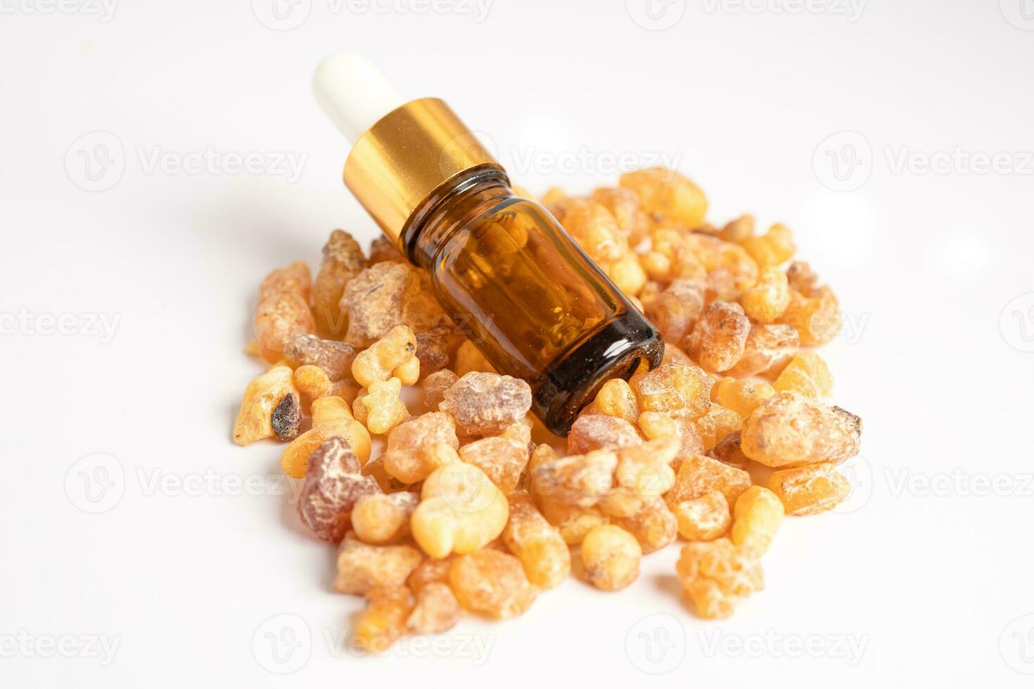 Frankincense or olibanum aromatic resin isolated on white background used in incense and perfumes. photo