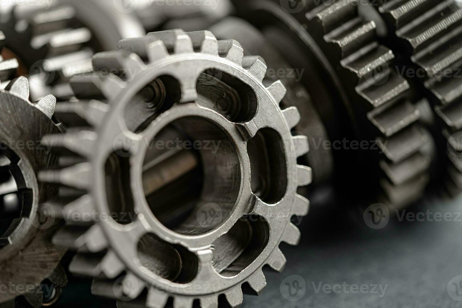 Gear and cogs wheels, clock mechanism, brass metal engine industrial. photo