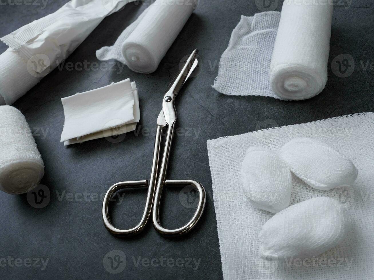 Medical bandages with scissors and sticking plaster. Medical equipment. photo