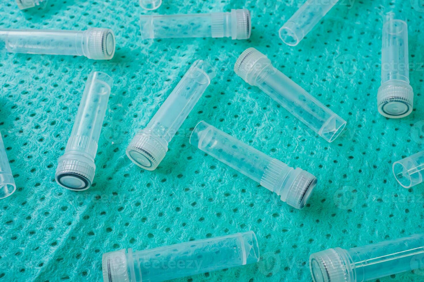 Plastic test tubes with caps for the collection of samples. Sampling tubes for laboratory examination. photo