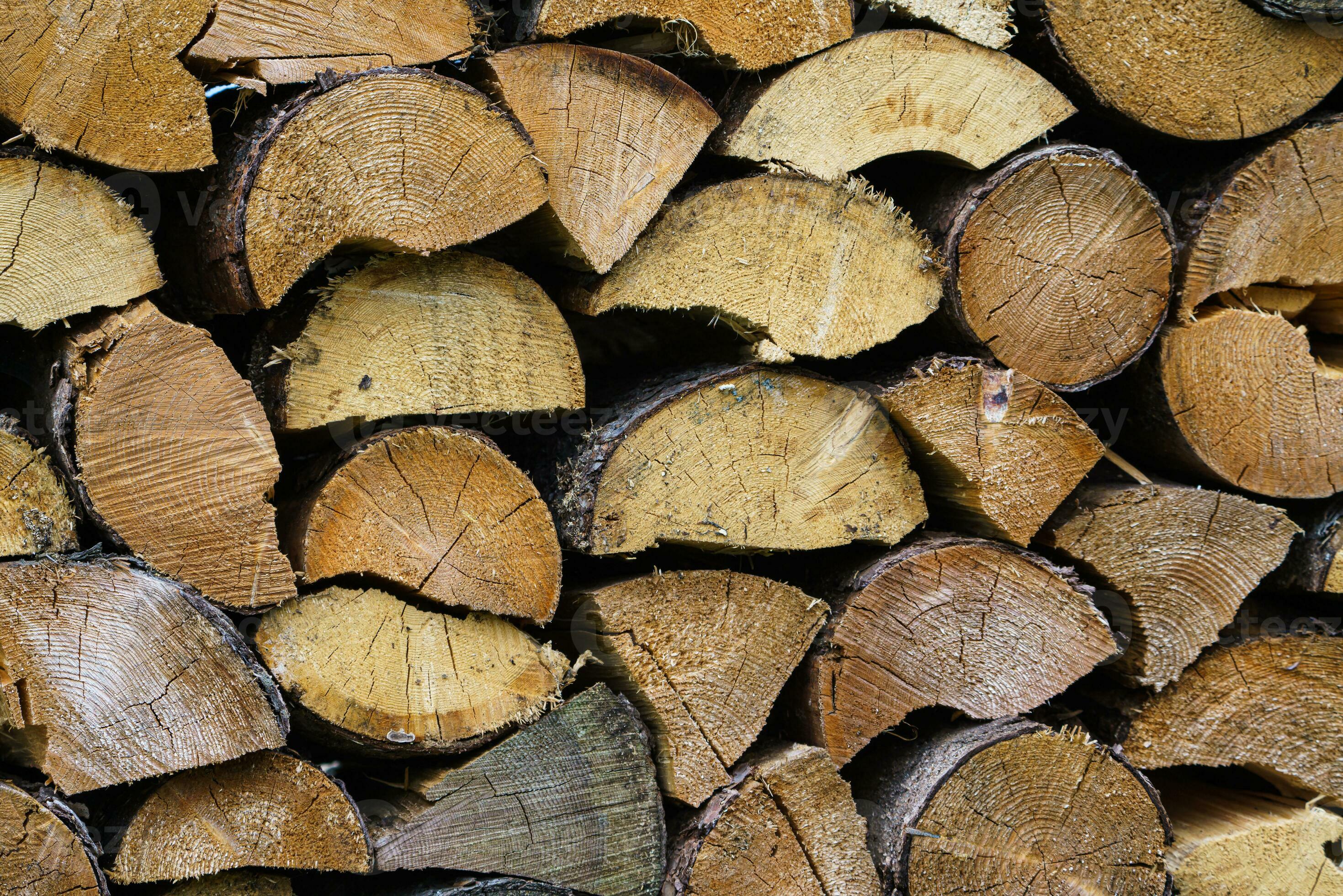 Stack of firewood prepared for winter. Spruce wood. 36053025 Stock Photo at Vecteezy