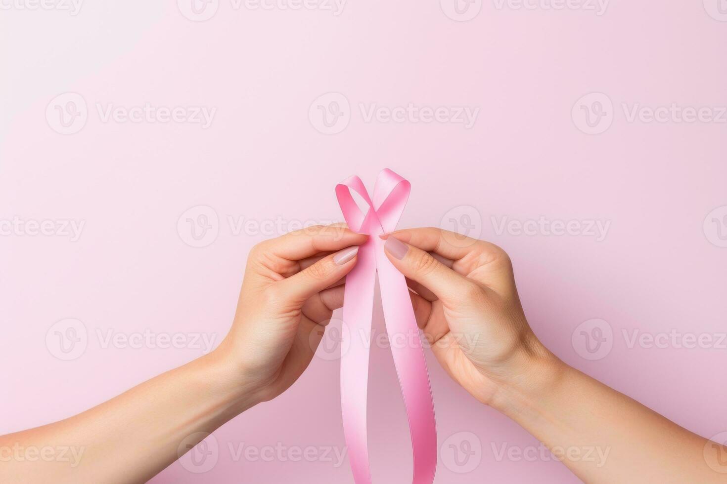 AI generated Pink ribbon held in female hands. Symbol of the fight against breast cancer photo