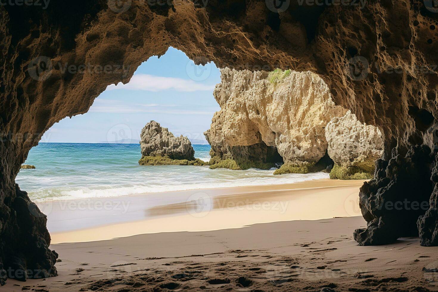 AI generated the beach from the inside of a large, rock cave photo