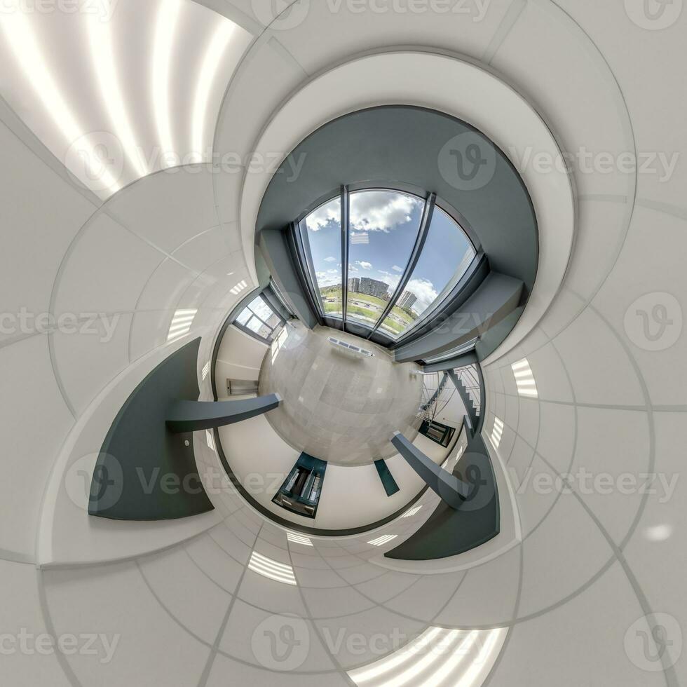 abstractly twisted into a spherical 360 panorama interior of a modern office with a hall staircase and panoramic windows photo