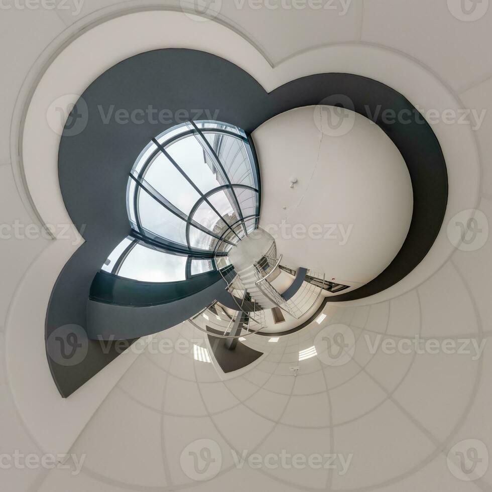 abstractly twisted into a spherical 360 panorama interior of a modern office with a hall staircase and panoramic windows photo