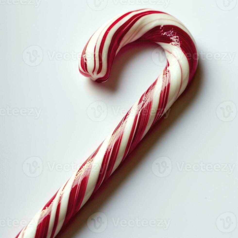 AI generated A striped red and white candy cane for a food-themed isolated on a white background. photo