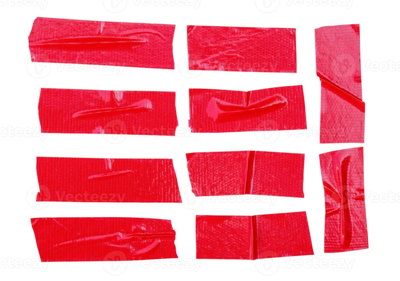 Red adhesive vinyl tape stripes in set isolated with clipping path. Top view and flat lay photo