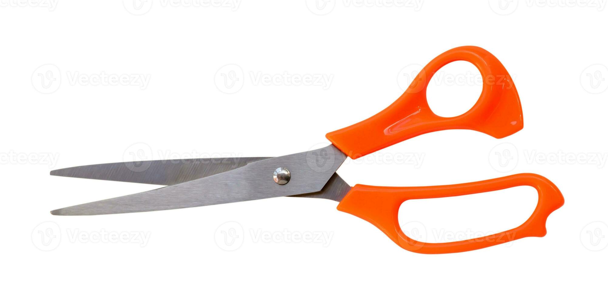 Multipurpose scissors with orange handle isolated on white background with clipping path photo