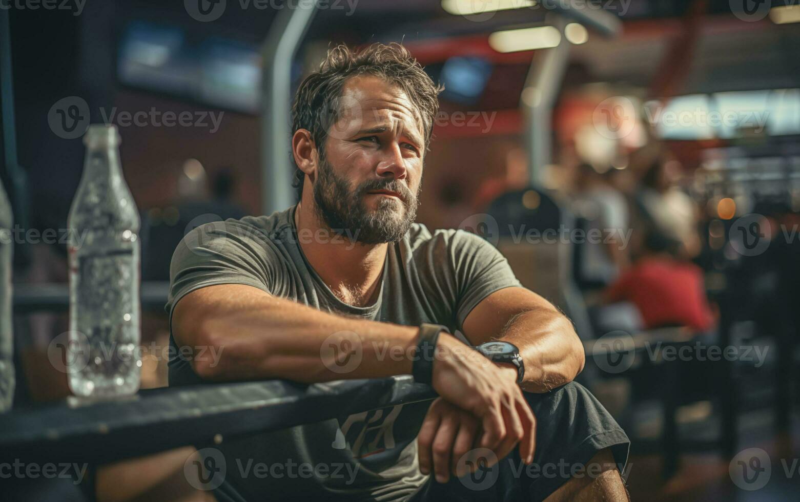 ai generado muscular atleta descansando Entre conjuntos y ejercicios en el gimnasio foto