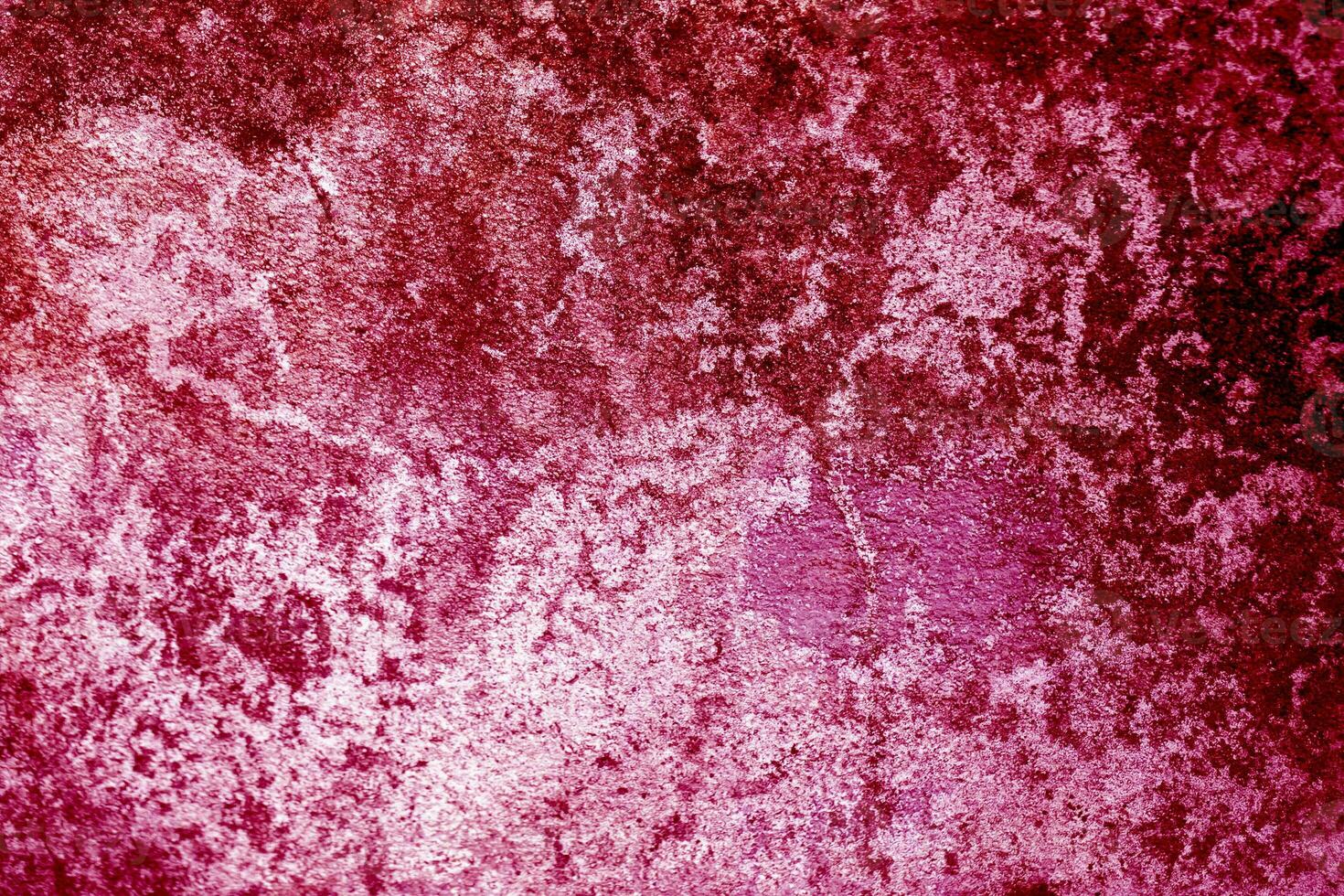 old grunge concrete wall texture or background viva magenta color of the year 2023 photo