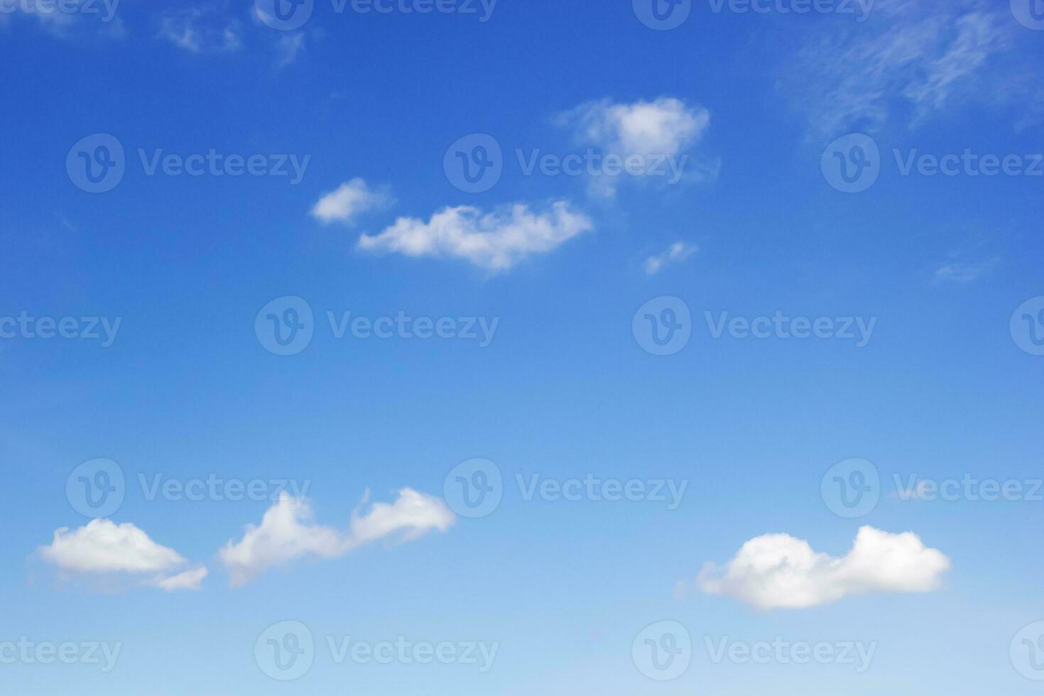 Blue sky background and white clouds soft focus, and copy space horizontal shape. photo