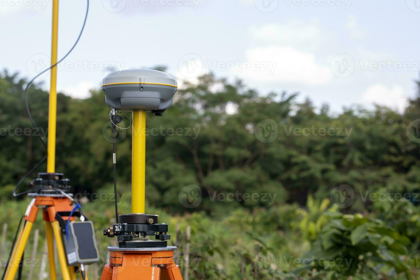 GPS surveying in field, Global Positioning System. photo