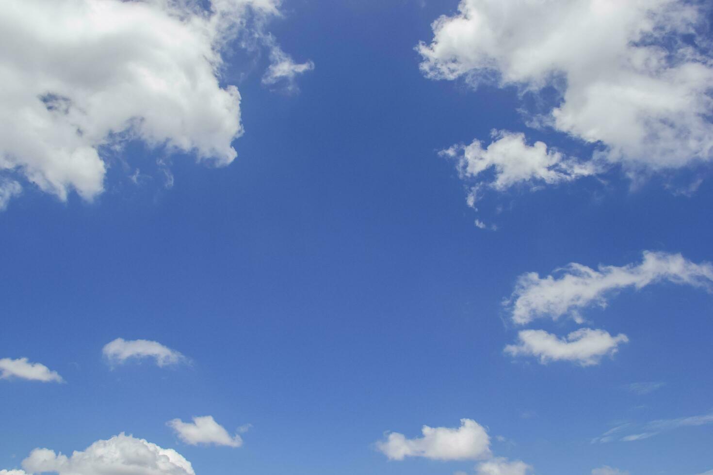 Blue sky background and white clouds soft focus, and copy space horizontal shape. photo