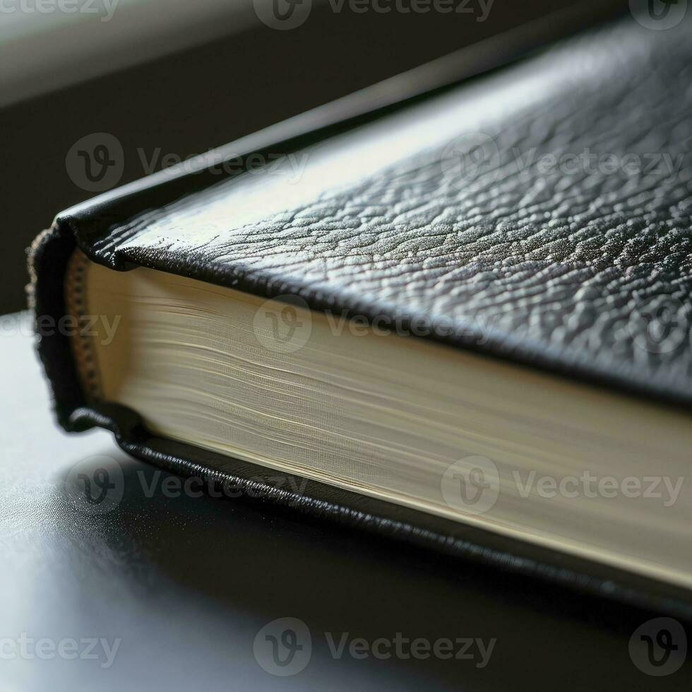 AI generated Close up view of a black book on a wooden table photo