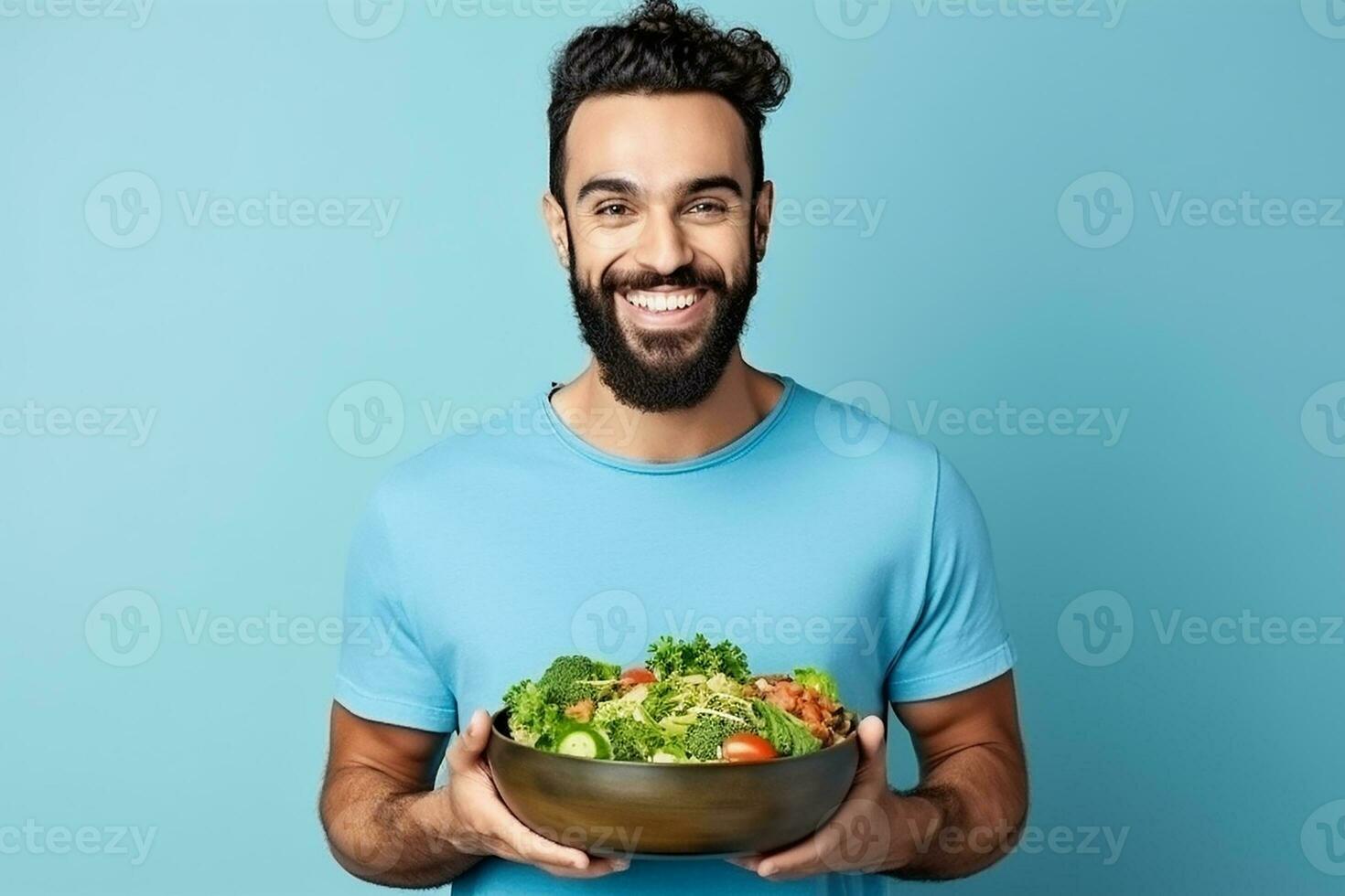 AI generated Happy young vegetarian posing at blue wall with glass bowl of fresh organic vegetables photo